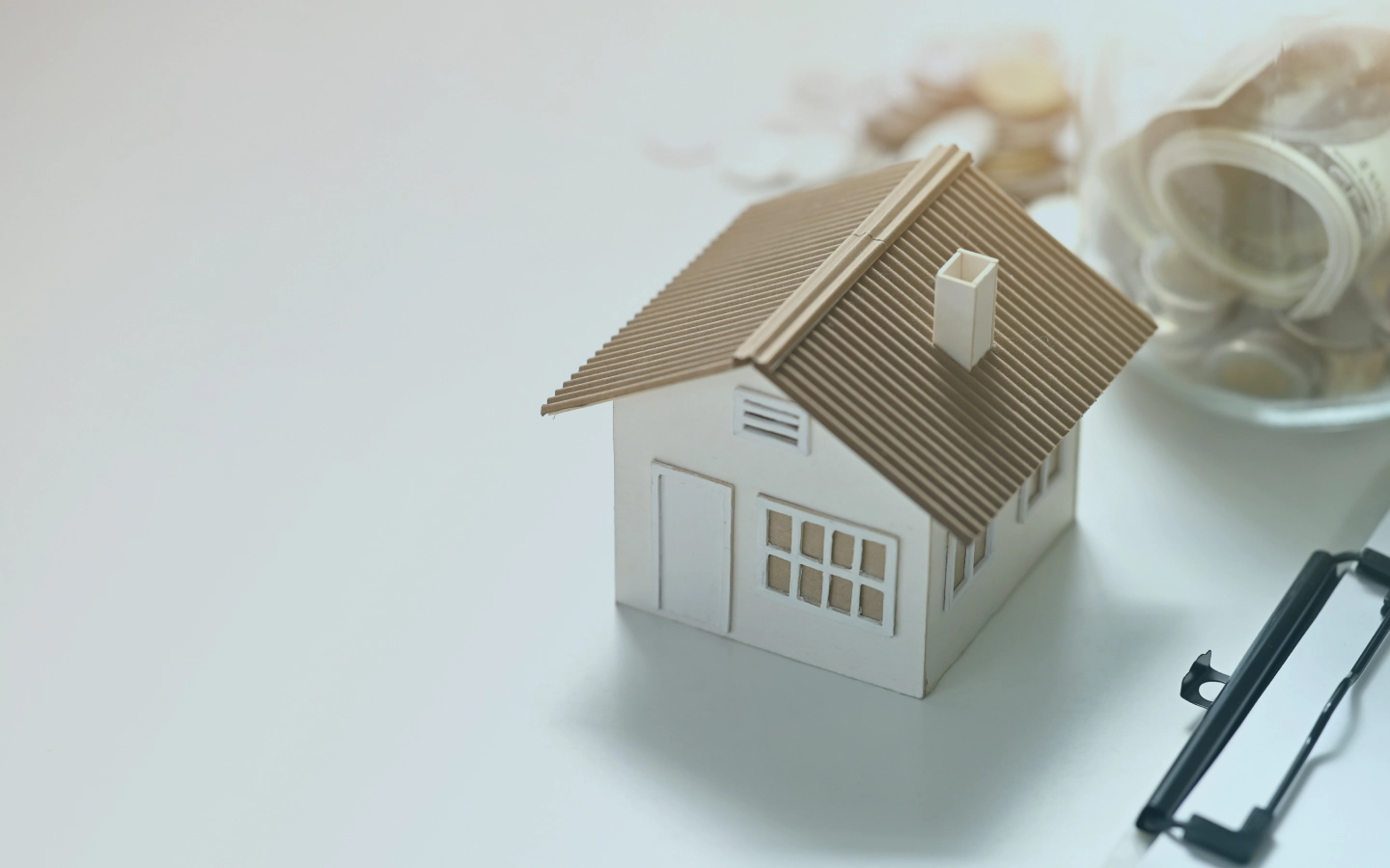 miniature house model and jar with money lexington ky